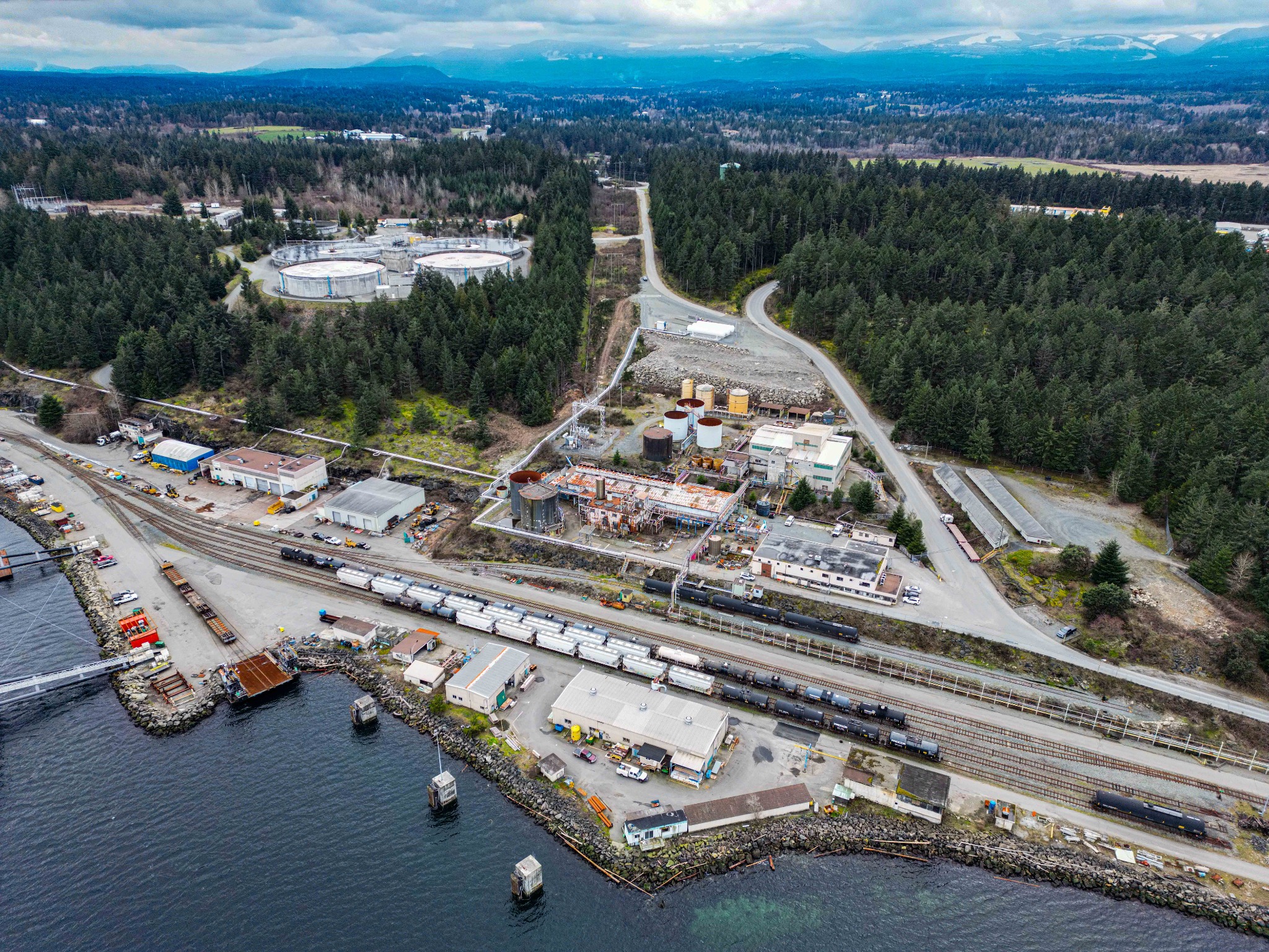 Railcars and marine access beside Orca Pacific Terminal